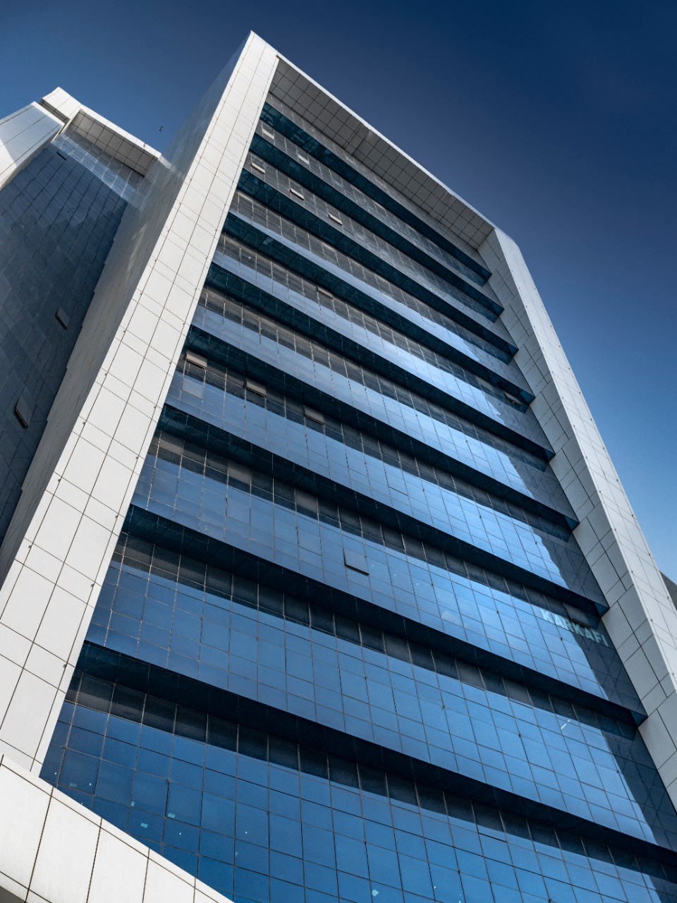 The Exchange Tower is a commercial building located in Business Bay, Dubai. It consists of 28 floors, three basement and podium levels and a ground floor. The Exchange Tower offers features such as 24/7 security, covered parking spaces, high-speed elevators, the latest communication technology, green open spaces with walkways, lagoon-side cafe and restaurants, as well as state-of-the-art safety and electrical systems. Additional amenities located in the building include a beauty salon, bank, clinic and pharmacy.