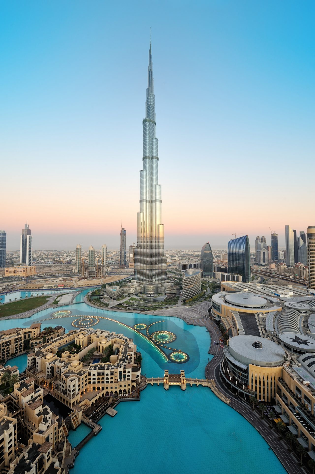 This is a very rare capture of burj khalifa and downtown dubai city in the first light morning with the fountain lights.